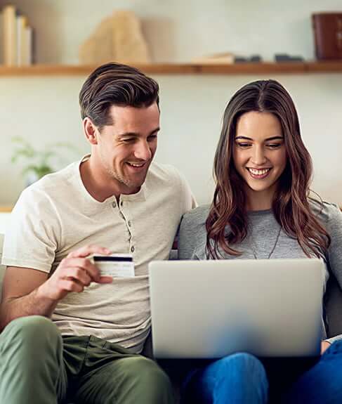 man and his wife paying bills