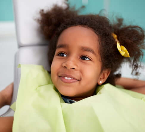 young girl at dentist