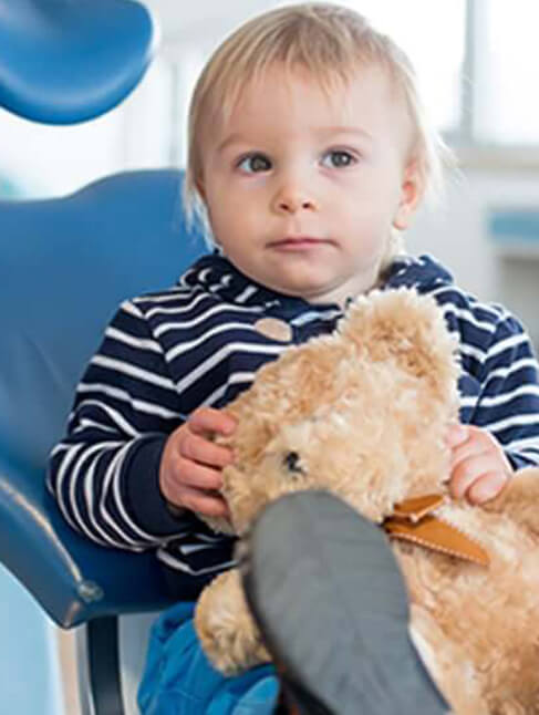 young boy in dental chair